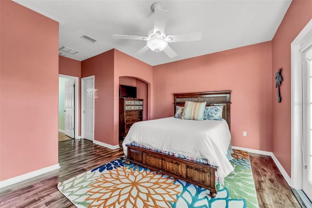 426 Magnolia Ave, Anna Maria, FL 34216 - bedroom featuring visible vents, baseboards, wood finished floors, and ceiling fan