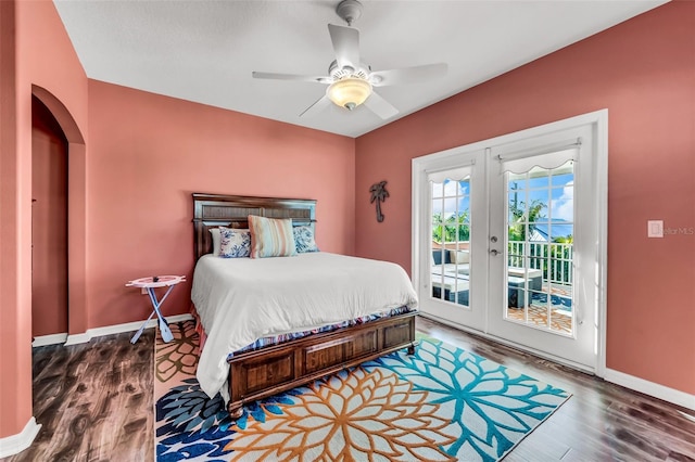 426 Magnolia Ave, Anna Maria, FL 34216 - bedroom with wood finished floors, ceiling fan, french doors, baseboards, and access to exterior