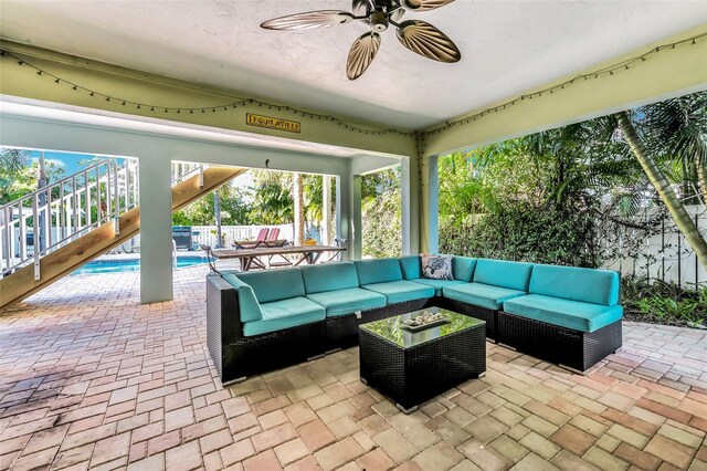 426 Magnolia Ave, Anna Maria, FL 34216 - view of patio / terrace featuring stairway, a fenced in pool, ceiling fan, and an outdoor hangout area