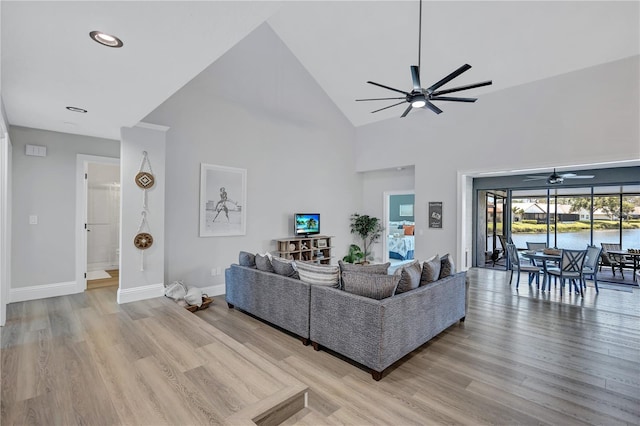 75 Inlets Blvd Unit 75, Nokomis, FL 34275 - living area featuring recessed lighting, a ceiling fan, light wood-type flooring, baseboards, and high vaulted ceiling