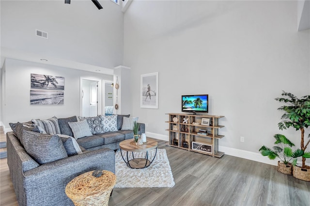75 Inlets Blvd Unit 75, Nokomis, FL 34275 - living room featuring wood finished floors, visible vents, and baseboards