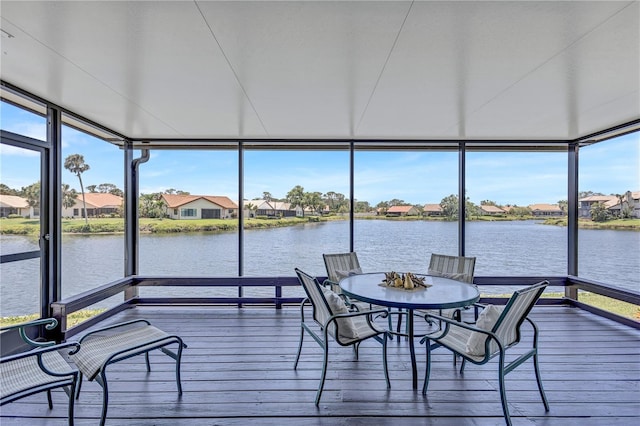 75 Inlets Blvd Unit 75, Nokomis, FL 34275 - sunroom / solarium featuring plenty of natural light, a residential view, and a water view
