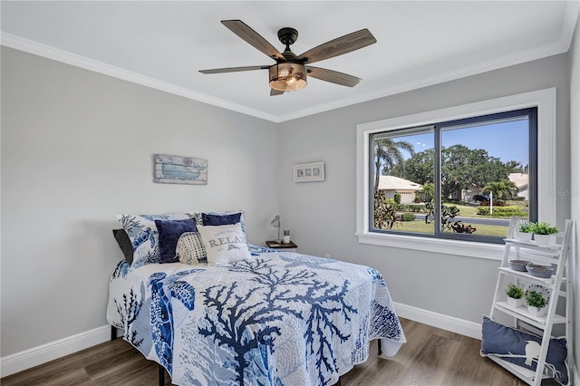 75 Inlets Blvd Unit 75, Nokomis, FL 34275 - bedroom with baseboards, a ceiling fan, wood finished floors, and crown molding