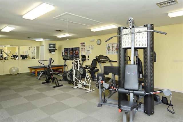75 Inlets Blvd Unit 75, Nokomis, FL 34275 - exercise room featuring attic access, baseboards, carpet flooring, and visible vents