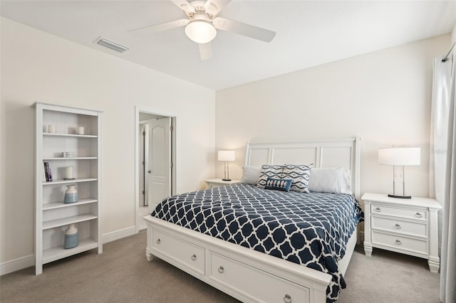 bedroom featuring visible vents, a ceiling fan, baseboards, and carpet floors