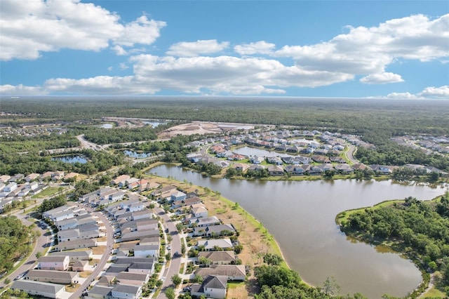 bird's eye view with a residential view and a water view