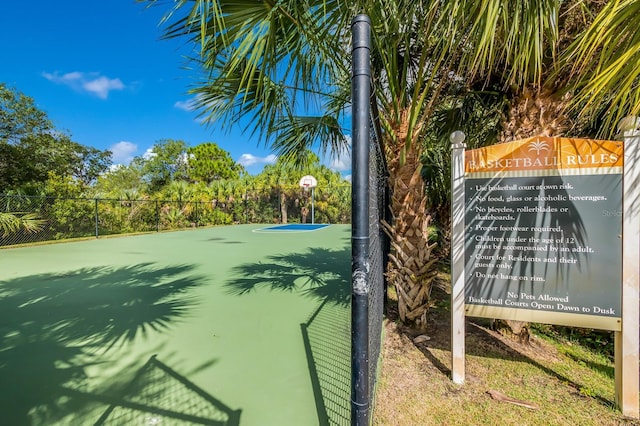 exterior space with fence and community basketball court