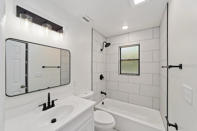 full bath with visible vents, toilet, vanity, and shower / washtub combination
