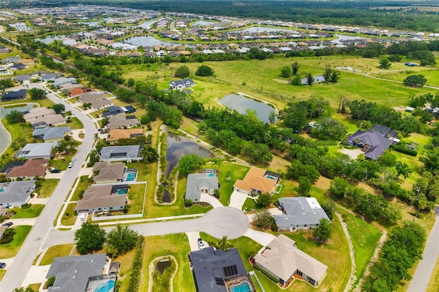 9101 Yarberry St, Sarasota, FL 34240 - aerial view of property and surrounding area with nearby suburban area and a large body of water