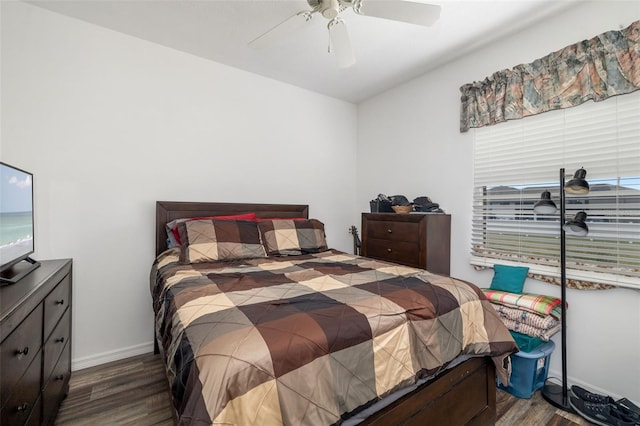 9101 Yarberry St, Sarasota, FL 34240 - bedroom with wood finished floors, baseboards, and a ceiling fan