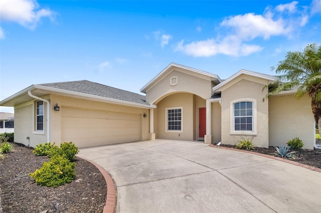 9101 Yarberry St, Sarasota, FL 34240 - single story home featuring stucco siding, concrete driveway, and a garage