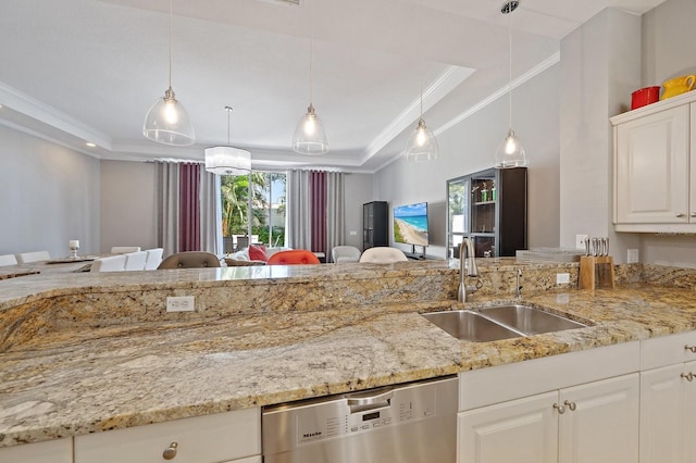 3405 54th Dr W Unit 102, Bradenton, FL 34210 - kitchen with a tray ceiling, a sink, crown molding, light stone countertops, and dishwasher