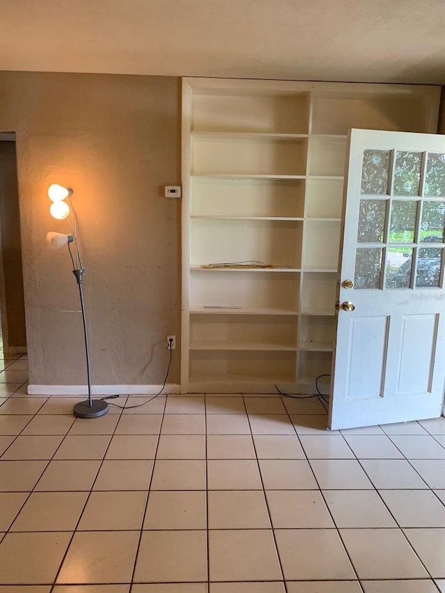 interior space featuring light tile patterned flooring