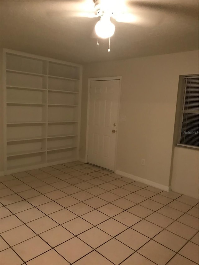 21291 Coulton Ave, Port Charlotte, FL 33952 - empty room featuring baseboards and built in shelves