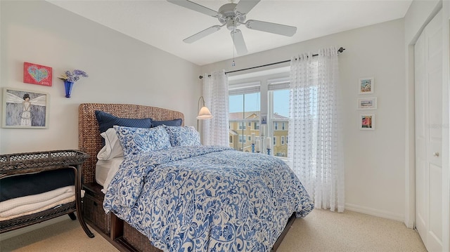 9008 White Sage Loop Unit 3605, Lakewood Ranch, FL 34202 - carpeted bedroom with baseboards and a ceiling fan