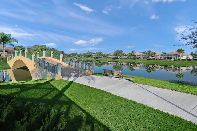 5821 Valente Pl, Sarasota, FL 34238 - exterior space with a lawn and a water view