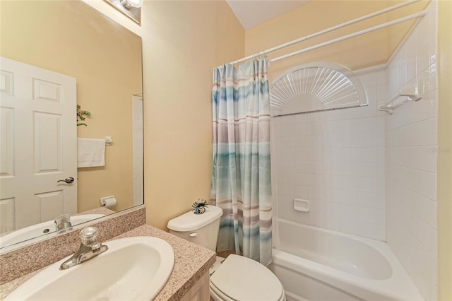 bathroom featuring shower / tub combo, toilet, and vanity