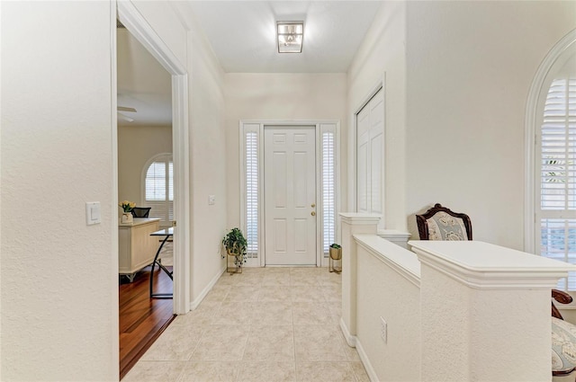 12838 Daisy Pl, Bradenton, FL 34212 - entryway with light tile patterned floors and baseboards