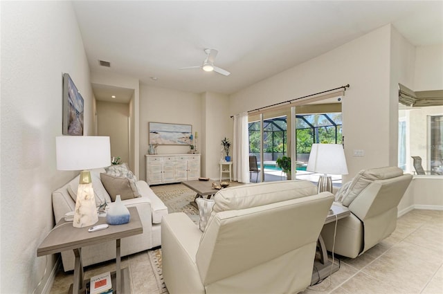 12838 Daisy Pl, Bradenton, FL 34212 - living room featuring ceiling fan, light tile patterned floors, and a sunroom