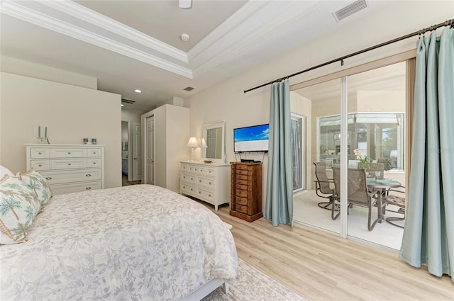 12838 Daisy Pl, Bradenton, FL 34212 - bedroom with crown molding, access to outside, light wood-type flooring, recessed lighting, and a raised ceiling