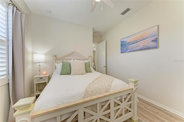 12838 Daisy Pl, Bradenton, FL 34212 - bedroom featuring light wood-style flooring and a ceiling fan
