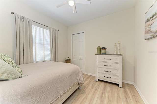12838 Daisy Pl, Bradenton, FL 34212 - bedroom featuring light wood-style flooring, ceiling fan, and a closet