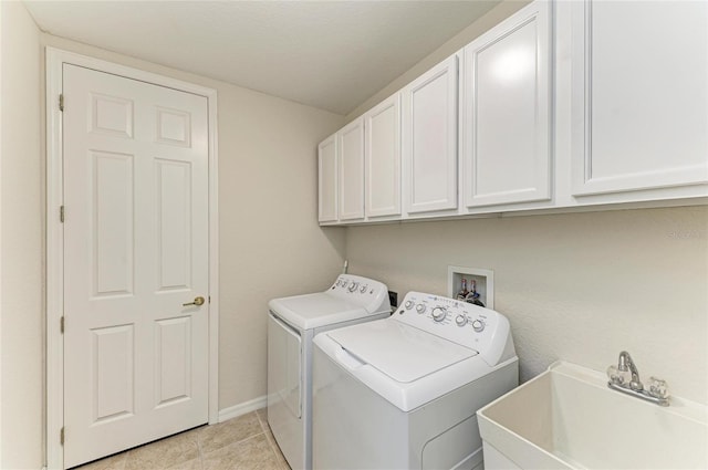 12838 Daisy Pl, Bradenton, FL 34212 - washroom featuring cabinet space, independent washer and dryer, and light tile patterned flooring