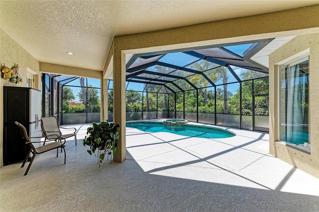 12838 Daisy Pl, Bradenton, FL 34212 - view of swimming pool with a patio area, a pool with connected hot tub, and a lanai