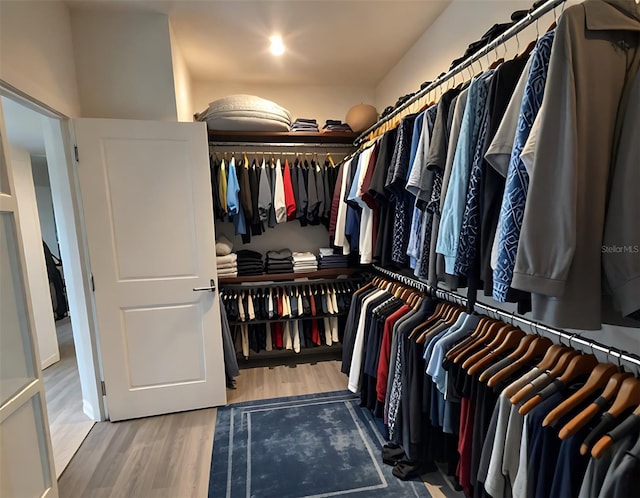 4970 Oyster Pearl St, Lakewood Ranch, FL 34211 - walk in closet with wood finished floors