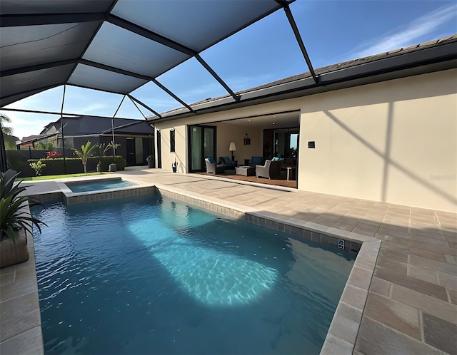 4970 Oyster Pearl St, Lakewood Ranch, FL 34211 - view of pool with a pool with connected hot tub, an outdoor hangout area, a patio, and glass enclosure
