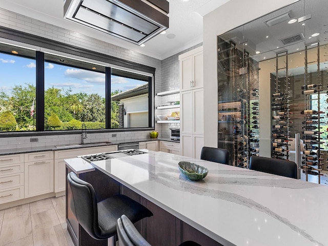 interior space with visible vents, recessed lighting, and a sink