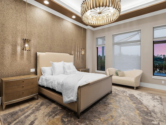bedroom featuring baseboards, recessed lighting, and wood finished floors