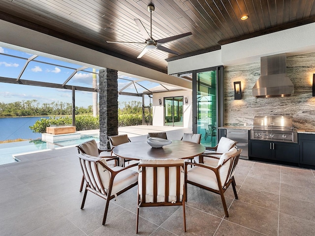 sunroom / solarium featuring a ceiling fan, area for grilling, and outdoor dining space