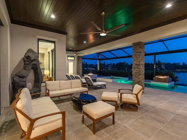 view of patio / terrace featuring an outdoor living space, a ceiling fan, an outdoor pool, and a hot tub