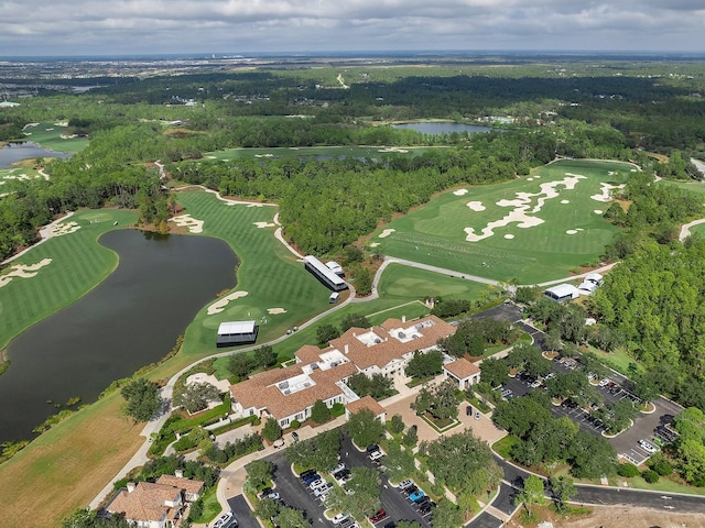 birds eye view of property featuring a water view and golf course view