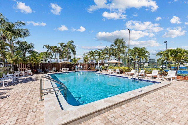 14519 Catalina Cir, Seminole, FL 33776 - community pool featuring fence and a patio