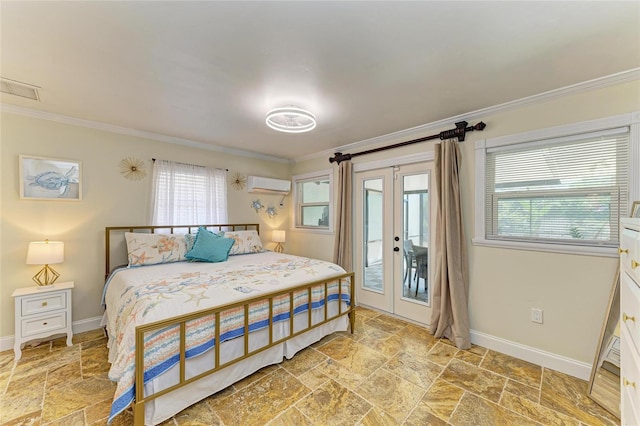 bedroom with an AC wall unit, stone tile flooring, crown molding, baseboards, and access to outside
