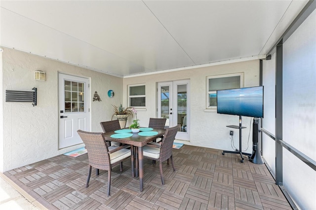 sunroom / solarium with french doors