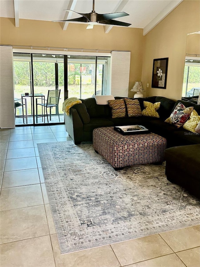 living room with vaulted ceiling, tile patterned flooring, and ceiling fan
