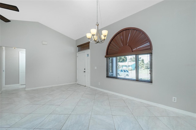 empty room featuring light tile patterned floors, high vaulted ceiling, and ceiling fan with notable chandelier