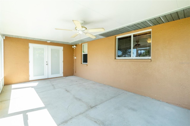exterior space featuring a ceiling fan and french doors
