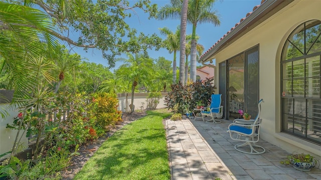 4691 Las Brisas Ln, Sarasota, FL 34238 - view of yard featuring a patio and fence private yard