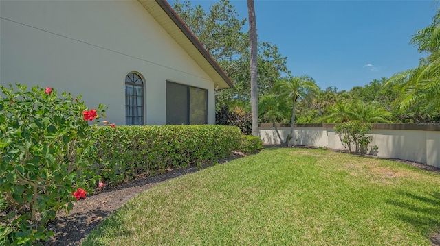4691 Las Brisas Ln, Sarasota, FL 34238 - view of yard featuring fence