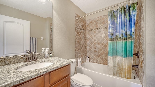 5403 Mang Pl, Sarasota, FL 34238 - full bathroom with a textured ceiling, vanity, toilet, a textured wall, and shower / bathtub combination with curtain