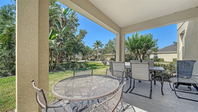 5403 Mang Pl, Sarasota, FL 34238 - view of patio / terrace featuring outdoor dining space