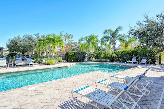5403 Mang Pl, Sarasota, FL 34238 - pool with a patio and fence