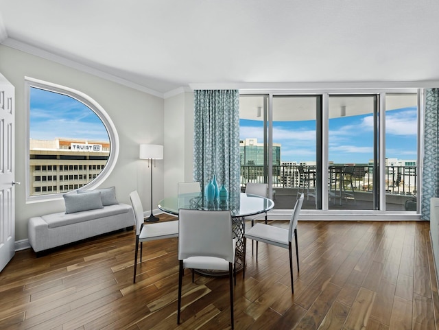 1771 Ringling Blvd Unit 1104, Sarasota, FL 34236 - dining room with crown molding, plenty of natural light, and wood finished floors