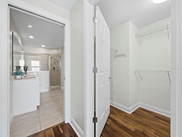1771 Ringling Blvd Unit 1104, Sarasota, FL 34236 - spacious closet featuring light wood finished floors