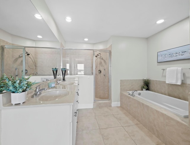 1771 Ringling Blvd Unit 1104, Sarasota, FL 34236 - bathroom featuring vanity, tile patterned flooring, a shower stall, and a garden tub