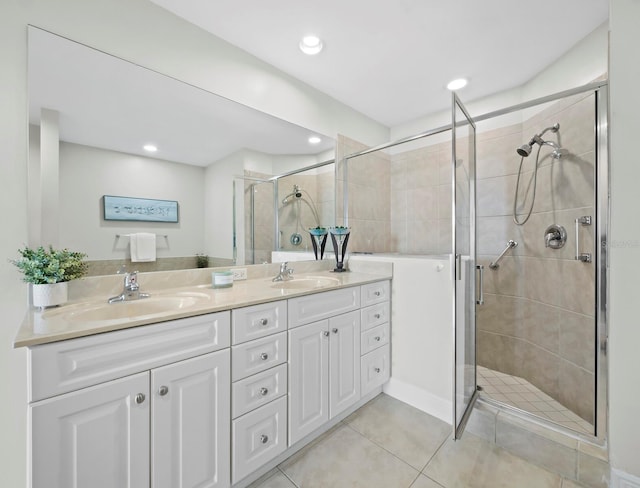 1771 Ringling Blvd Unit 1104, Sarasota, FL 34236 - full bath with a sink, tile patterned floors, and a stall shower